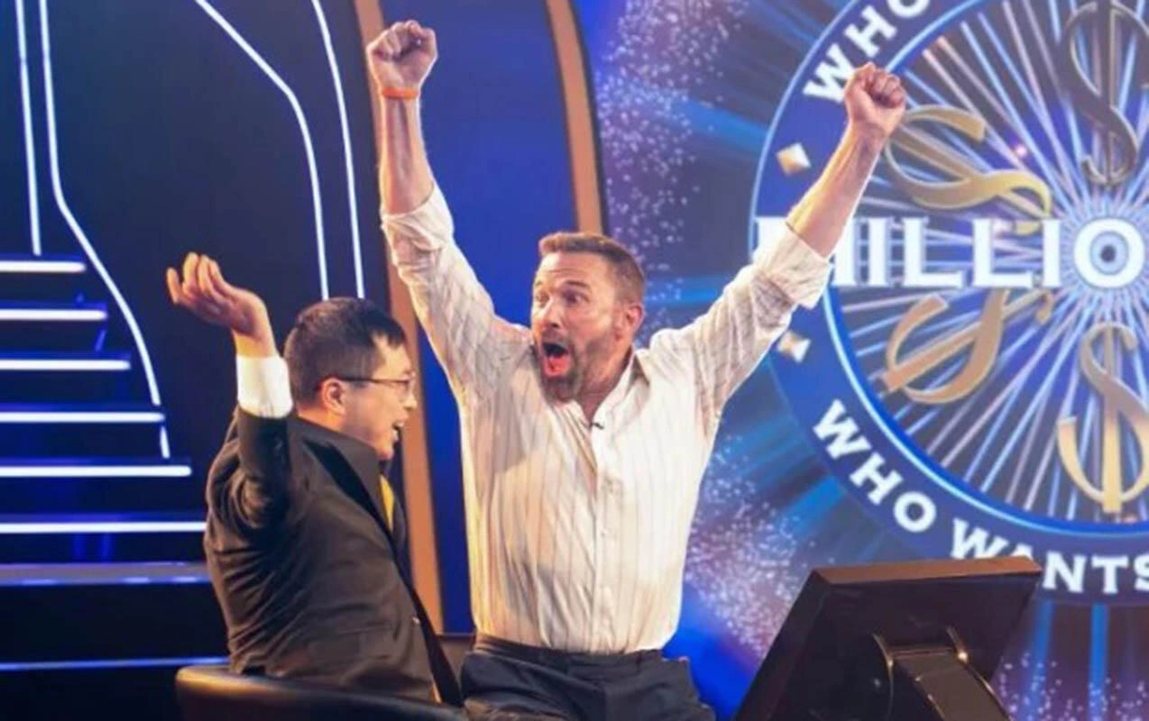 Ben Afflek "Kim milyonçu olmaq istəyir?"də 1 milyon dollar qazandı - (Foto)